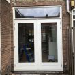 Harthouten pui met openslaande deuren geleverd en geplaatst aan de Berkelstraat te Utrecht.