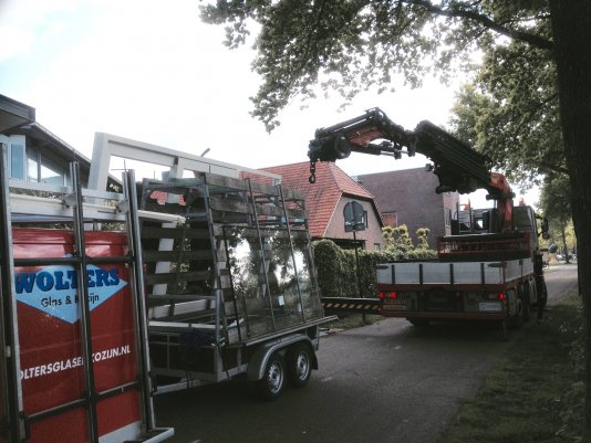 Leveren en plaatsen hardhouten schuifpui met Saint Gobain Climaplus HR++ isolatieglas Nieuwland Amersfoort.